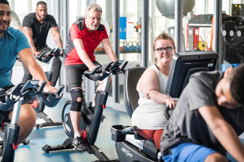 People exercising on bikes