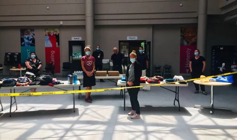 Staff members from the Centre Branch in London set up hygiene facilities open to the public.