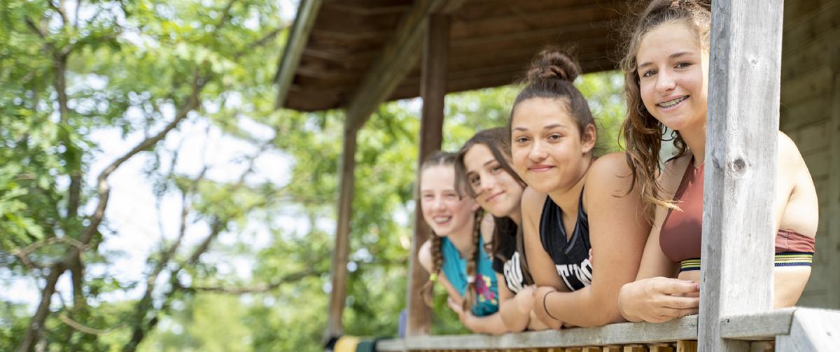 CQE girls hanging at their cabin during free time