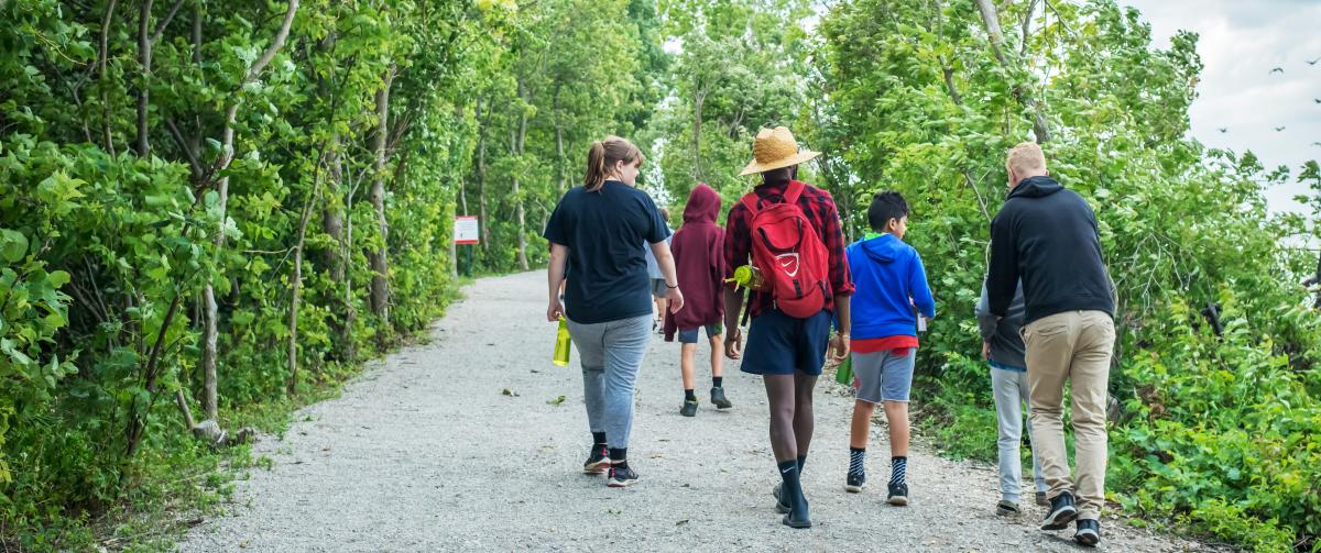 Group of campers and counselors enjoying a hike at Camp Henry