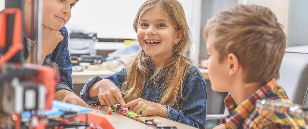 Children working together, playing with LEGO